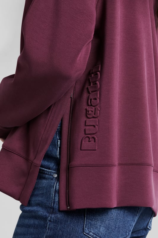 Das lässige Sweatshirt ist aus super softer Modalware gefertigt. Seitenschlitze sorgen für Bewegungsfreiheit. Der Pullover ist einfach zu kombinieren und damit der ideale Begleiter in der Freizeit und im Büroalltag.