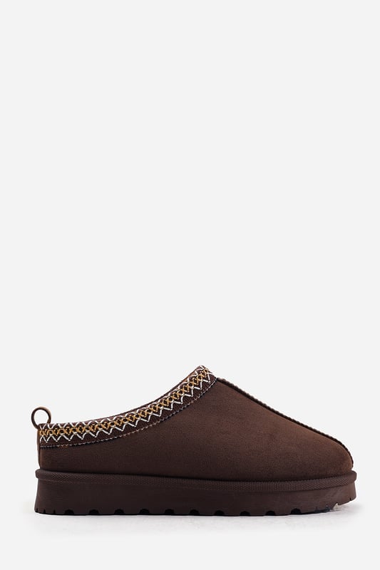 Wheres That From Womens 'Oak' Aztec Detail Faux Fur Lining Mini Boots Stay warm and stylish with our Oak Aztec Detail Faux Fur Lining Mini Boots, featuring cozy faux fur lining and eye-catching Aztec detailing. The low ankle design and slip-on fit make them an easy everyday essential. Perfect for pairing with jeans, leggings, or loungewear for a relaxed, comfortable look all day long. Key Features: • Material: Soft faux suede with faux fur lining • Design: Mini ankle boots with contrast Aztec detail • Closure: Convenient slip-on style