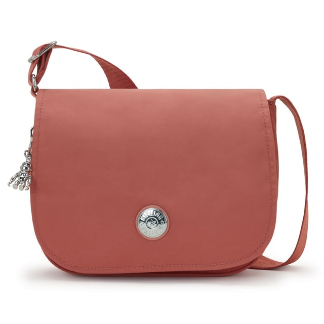 The Kipling Loreen M Women's Pink Crossbody Bag is a stylish and practical accessory designed to offer both functionality and a pop of color. With its medium size, this crossbody bag provides ample space for your essentials while maintaining a chic and modern look.
Key features:
Medium-Sized Design: 

The Loreen M offers the ideal size for carrying essentials like your phone, wallet, makeup, and keys without being too bulky. Its compact yet roomy design makes it perfect for everyday use or casual outings.

Durable Nylon Fabric: 

Made from Kipling's signature lightweight and water-resistant nylon material, this bag is durable, easy to clean, and perfect for daily use. The fabric is resistant to wear, ensuring the bag remains in great condition over time.

Adjustable Crossbody Strap: 

The bag features a comfortable, adjustable shoulder strap, allowing you to customize the fit for added convenience and comfort. You can wear it across your body or on your shoulder, keeping your hands free.

Vibrant Pink Color: 

The bold pink color adds a fun and energetic touch to the bag, making it a stylish statement piece that pairs well with a variety of outfits, from casual to semi-casual looks.

Kipling Monkey Keychain: 

Like many Kipling bags, the Loreen M features the signature Kipling monkey keychain, adding a playful and recognizable detail that adds personality to the design.

Zippered Closure: 

The bag’s main compartment is secured with a zipper, ensuring that your belongings stay safe and protected while you’re on the move.

Functional Interior: 

The bag includes several compartments to help keep your items organized. It has a spacious main compartment and smaller zippered and slip pockets, providing easy access to your essentials.

The Kipling Loreen M Women's Pink Crossbody Bag is the perfect blend of style, practicality, and fun. Whether you're heading to work, running errands, or enjoying a day out, this crossbody bag offers both functionality and a vibrant touch to your look.