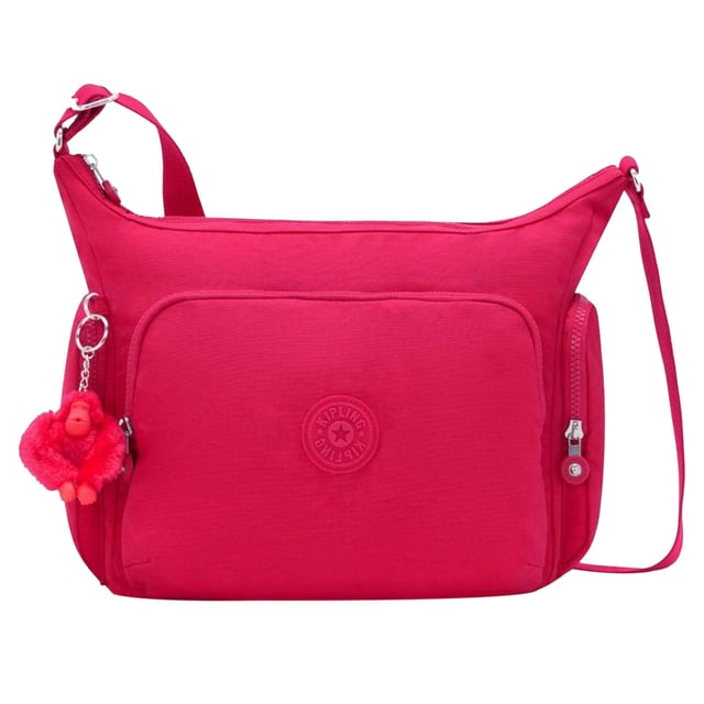 The Kipling Gabb Women's Pink Crossbody Bag is a fun and functional accessory designed for women who want to combine style with practicality. This bag’s vibrant pink color adds a bold touch to your outfit, while its compact design ensures you can carry your essentials with ease.
Key features:
Compact Crossbody Design: 

The Gabb crossbody bag is designed to offer hands-free convenience, with an adjustable strap that allows you to customize the fit for a comfortable and secure wear across your body or on your shoulder.

Durable Nylon Fabric: 

Made from Kipling’s signature lightweight and water-resistant nylon, this bag is not only durable but also easy to clean. It’s perfect for daily use, keeping your essentials safe and organized while standing up to wear and tear.

Spacious and Organized Interior: 

Despite its compact size, the bag offers a well-organized interior with a main compartment and smaller pockets, making it easy to store and access your phone, wallet, keys, makeup, and other small essentials.

Vibrant Pink Color: 

The bold pink color makes this bag a fun and eye-catching accessory that can easily complement a variety of outfits, from casual to chic.

Signature Kipling Monkey Keychain: 

The Gabb bag includes Kipling’s signature playful monkey keychain, adding a unique and fun touch to the overall design.

Zippered Closure: 

The main compartment is secured with a zipper, ensuring your belongings stay safe and protected while you’re on the move.

Lightweight and Comfortable: 

The lightweight design ensures all-day comfort, while the adjustable strap allows for a customizable, comfortable fit.

The Kipling Gabb Women's Pink Crossbody Bag is perfect for women looking for a stylish, functional, and compact bag that offers convenience and fun. Whether you’re running errands or going out with friends, this crossbody bag is a great choice for carrying your essentials in style.
