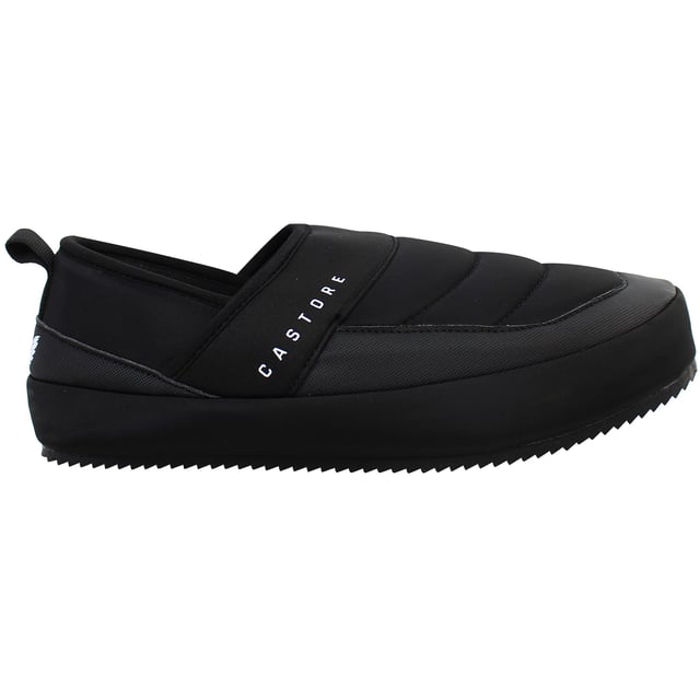 Step into everyday ease with the Castore Logo Men’s Black Slippers — a sleek, minimalist essential designed for post-training recovery, home comfort, or laid-back style. Blending Castore’s refined aesthetic with simple functionality, these slip-ons deliver understated luxury with every step.
Key Features:
Moulded EVA Footbed:

Lightweight and cushioned for optimal comfort, ideal for daily wear around the house, gym, or poolside.

Wide Synthetic Strap:

Smooth, soft upper strap provides a secure yet comfortable fit, designed for easy slip-on access.

Debossed Castore Logo:

Features a bold yet subtle logo across the strap for a premium, athletic-inspired finish.

Durable Rubber Outsole:

Offers grip and stability on a variety of indoor and outdoor surfaces.

Water-Resistant Construction:

Suitable for use in wet areas like locker rooms, showers, or pool decks.

Whether you’re cooling down after a session or kicking back at home, the Castore Logo Slippers combine performance simplicity with everyday comfort and sharp visual appeal.