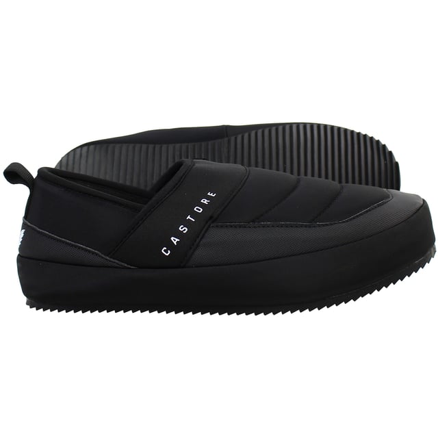 Step into everyday ease with the Castore Logo Men’s Black Slippers — a sleek, minimalist essential designed for post-training recovery, home comfort, or laid-back style. Blending Castore’s refined aesthetic with simple functionality, these slip-ons deliver understated luxury with every step.
Key Features:
Moulded EVA Footbed:

Lightweight and cushioned for optimal comfort, ideal for daily wear around the house, gym, or poolside.

Wide Synthetic Strap:

Smooth, soft upper strap provides a secure yet comfortable fit, designed for easy slip-on access.

Debossed Castore Logo:

Features a bold yet subtle logo across the strap for a premium, athletic-inspired finish.

Durable Rubber Outsole:

Offers grip and stability on a variety of indoor and outdoor surfaces.

Water-Resistant Construction:

Suitable for use in wet areas like locker rooms, showers, or pool decks.

Whether you’re cooling down after a session or kicking back at home, the Castore Logo Slippers combine performance simplicity with everyday comfort and sharp visual appeal.