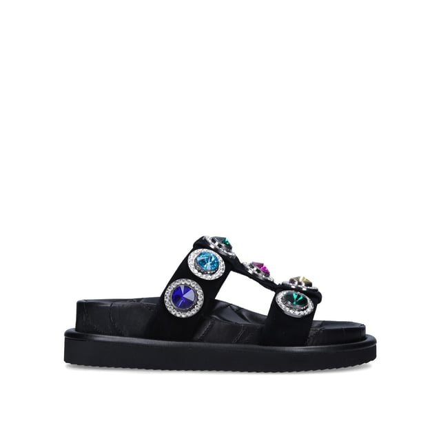 The Orson Crystal Sandal arrives in a black suede. The strap is topped with oversized multi-colour crystals. Overstitched quilted insole with padding, seen across the collections.