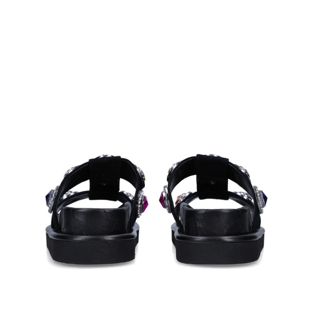 The Orson Crystal Sandal arrives in a black suede. The strap is topped with oversized multi-colour crystals. Overstitched quilted insole with padding, seen across the collections.