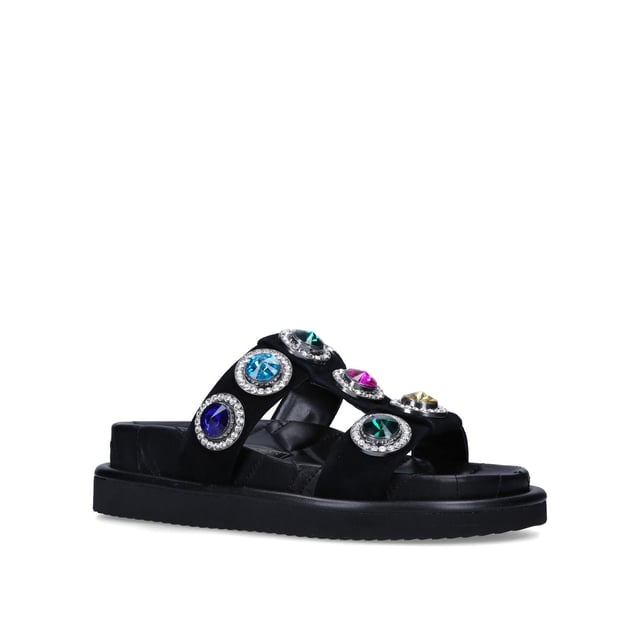 The Orson Crystal Sandal arrives in a black suede. The strap is topped with oversized multi-colour crystals. Overstitched quilted insole with padding, seen across the collections.