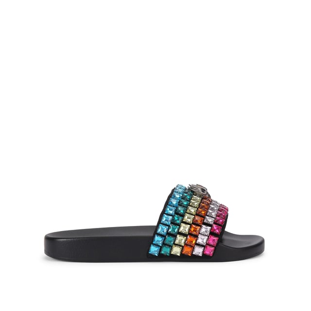 This Carvela Meena Eagle sandal slips onto the foot with a black moulded footbed. The toe strap is designed in the rainbow Kensington weave with Kurt Geiger London branding on a crystal coated canvas. There is an antiqued silver eagle head sat on top.