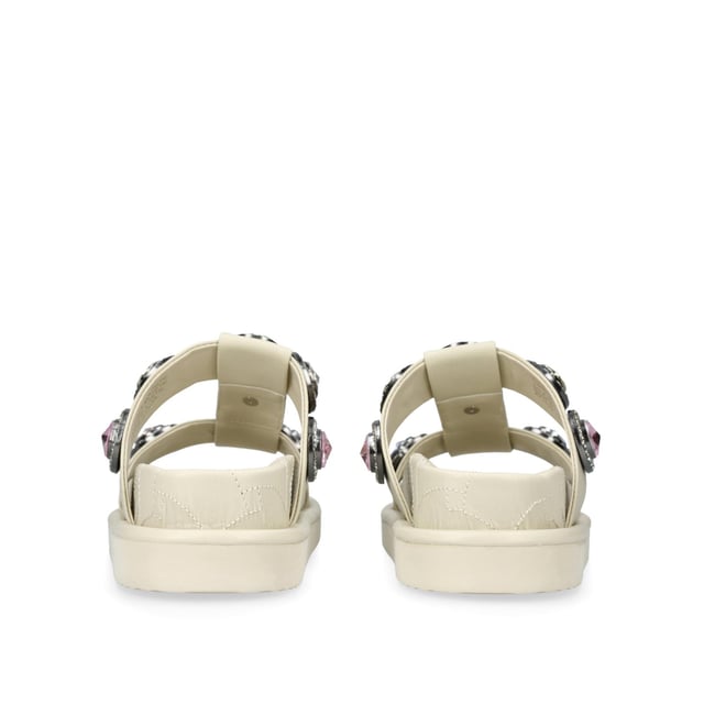 The Orson Crystal Sandal arrives in a sleek bone. The strap is topped with oversized multi-colour crystals. Overstitched quilted insole with padding, seen across the collections.