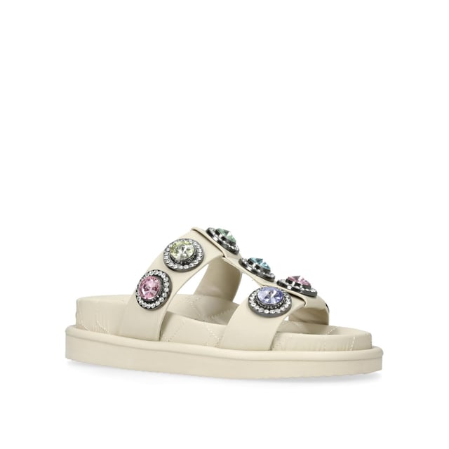 The Orson Crystal Sandal arrives in a sleek bone. The strap is topped with oversized multi-colour crystals. Overstitched quilted insole with padding, seen across the collections.