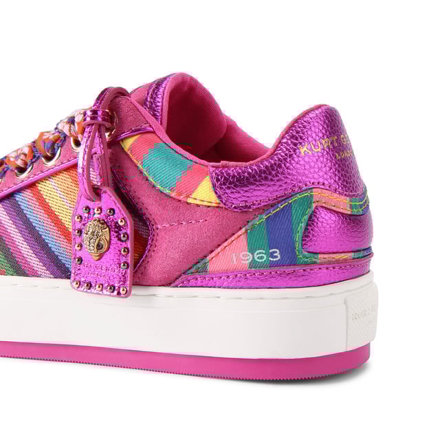 This Kurt Geiger pair of Southbank Tag sneakers are crafted from a pink leather with multi-colour striped panels on either side. There are orange and blue floral wide laces at the front and a metallic pink luggage style tag on them.