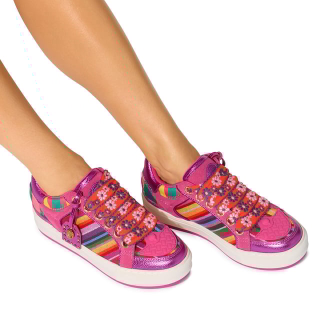 This Kurt Geiger pair of Southbank Tag sneakers are crafted from a pink leather with multi-colour striped panels on either side. There are orange and blue floral wide laces at the front and a metallic pink luggage style tag on them.