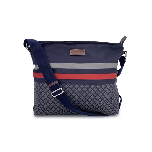VINTAGE, RRP AS NEW
A nod to sporty sophistication with unmistakable Gucci flair, the Diamond Messenger Shoulder Bag is a standout piece from the Italian house's contemporary era. Unisex model, the bag is crafted from durable printed blue nylon, and combines utilitarian function with signature heritage Condition Rating: B - VERY GOOD CONDITIONCondition Details: Gently used. Some normal wear of use on bottom corners. Some light scratches on brown leather trim. Please check the images carefully. Please ask if you need to know more details or if you have any doubts.Measurements (cm):Depth: 12.7Height: 29.2Length: 35.6Other Details: Dustbag? NoKeys? NoBox? No Measurments:  width: 127 mm length: 356 mm height: 292 mm strap length: 0 mm handle drop: 0 mm