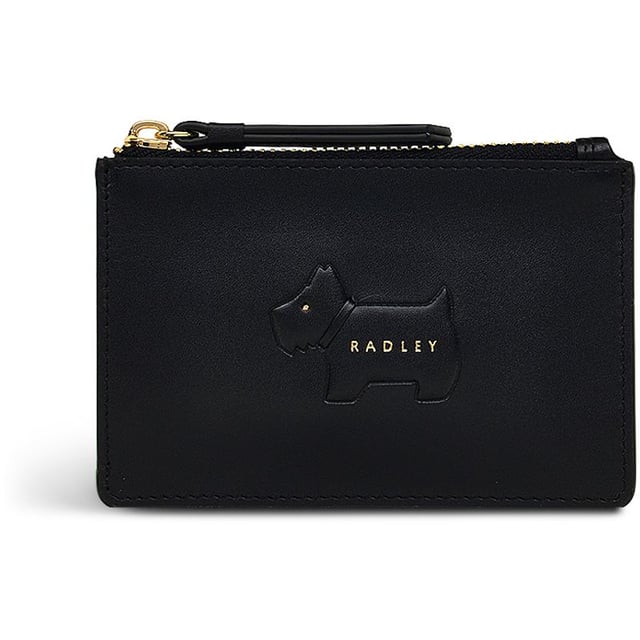 Bolso acolchado negro para mujer de Radley, fabricado con cuero. Presenta: perro scottie acolchado, cierre de cremallera, tres ranuras para tarjetas, tirador de cremallera de cuero y medidas de 12 cm de ancho x 8 cm de alto.