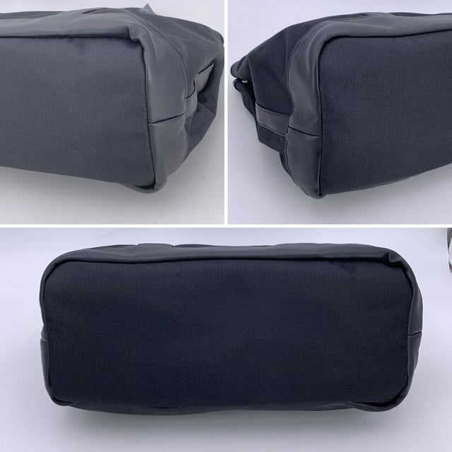 VINTAGE, RRP AS NEW
Understated, refined, and undeniably rare, this Vintage Yves Saint Laurent Pour Homme tote captures the quiet confidence of YSL's menswear line in a form that still feels effortlessly modern. Crafted from durable black nylon canvas and accented with sleek black leather trim, this tote is a functional piece with subtle designer distinction.  At the front, a silver metal Yves Saint Laurent tab adds a discreet touch of luxury, while the magnetic button closure opens to reveal a black nylon canvas lining-clean, simple, and timeless. Inside, a zip pocket offers secure storage, and the original 'Yves Saint Laurent' tag affirms the bag's ity. A true collector's bonus: the 'Yves Saint Laurent Pour Homme' shop hang tag remains thoughtfully attached, hinting at the bag's pristine and possibly unused Condition Rating: A - EXCELLENTCondition Details: Gently used. Yves Saint Laurent hang tag still attached. Please check the photos carefully and ask if you need to know more details or if you have any doubts.Measurements (cm):Depth: 15.2Height: 24.1Length: 35.6Other Details: Dustbag? NoKeys? NoBox? No Measurments:  width: 152 mm length: 356 mm height: 241 mm strap length: 0 mm handle drop: 0 mm
