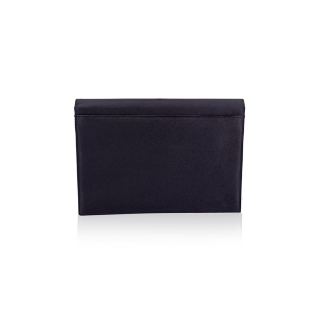 VINTAGE, RRP AS NEW
Step into timeless elegance with this vintage Yves Saint Laurent clutch bag - a true emblem of classic Parisian sophistication. Crafted in brown leather, this refined piece echoes the understated glamour of eras past. The structured silhouette is anchored by a front flap with a magnetic button closure, crowned with the iconic YSL logo - a quiet nod to one of fashion's most enduring maisons.  Open the flap to reveal a fabric-lined interior, thoughtfully designed with a side zip pocket for your evening essentials. A rear open pocket adds practicality without compromising its sleek form. Inside, the 'YVES SAINT LAURENT' embossing is a subtle reminder of its storied lineage.  Whether tucked under your arm or proudly displayed on a vanity, this vintage YSL clutch isn't just an accessory - it's a chapter of fashion history, waiting to be carried into the night. Condition Rating: A - EXCELLENTCondition Details: Gently Used. Minimal scratches on leather due to normal use. Please check the images carefully. Please ask if you need to know more details or if you have any doubts.Measurements (cm):Depth: 2.5Height: 16.5Length: 24.1Other Details: Dustbag? NoKeys? NoBox? No Measurments:  width: 25 mm length: 241 mm height: 165 mm strap length: 0 mm handle drop: 0 mm