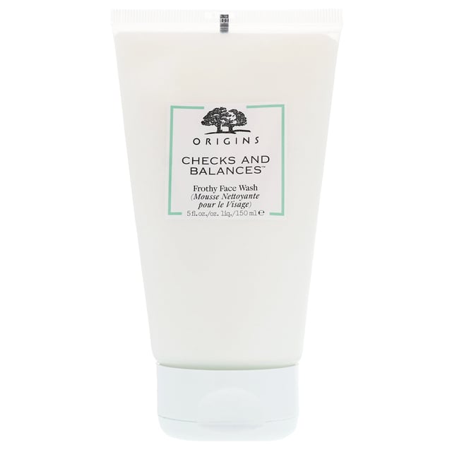 Discover the Origins Checks and Balances Frothy Face Wash, a luxurious cleanser that effortlessly removes makeup and impurities for a fresh, radiant complexion. Enriched with Broad Leaf Kelp Extract, Wheat Protein, and Tourmaline, this formula purifies and revitalizes all skin types. The invigorating Mint essential oil adds a refreshing touch to your cleansing routine. To use, lather in your palms with water, apply to your face while avoiding the eye area, and rinse thoroughly. Free from harsh chemicals and 100% vegetarian, this face wash is a perfect addition to your skincare regimen.