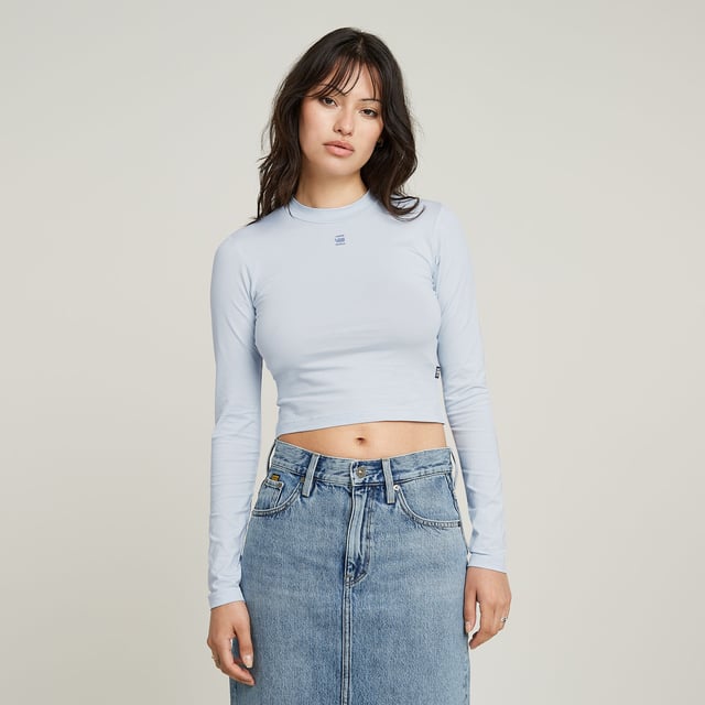 Mock neck. G-STAR print at the chest. Woven G-STAR Originals label at the lower side seam. No closure. Mock top Cropped is cut in a superslim fit and offers a short length. The sleeves are kept slightly longer. 95% Organic cotton, 5% Elastane. Super stretch. Jersey knit. Super Slim