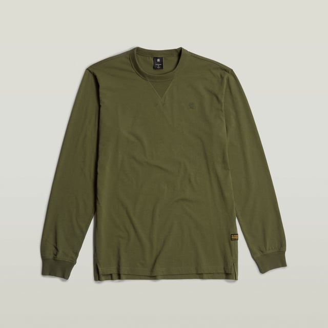 Ribbed neckline and inset. Ribbed cuffs. Side slits. G-Star RAW embroidery at the chest. Woven G-Star Originals label at the lower side seam. No closure. Long sleeved T-shirt Nifous features a straight fit with side slits. The ribbed inset at the front neck adds detail. 100% Organic cotton. Built-in stretch