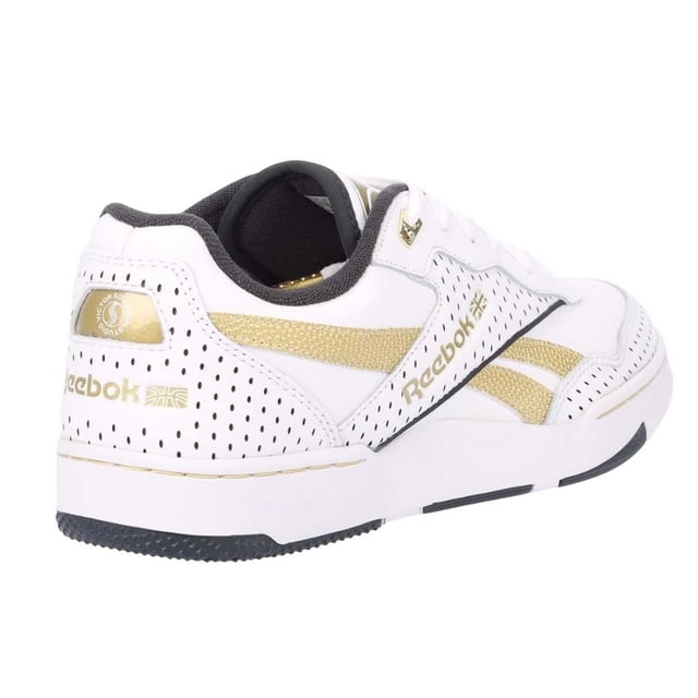 Reebok - "BB 4000 II" Sneaker für Herren/Damen Unisex, Leder (Weiß/Gold) Obermaterial: Leder. Marke: Reebok. Futterstoff: Stoff. Einlegesohle: Synthetischer Stoff. Mittelsohle: Synthetischer Stoff. Laufsohle: Gummi. Ösen: 6. Atmungsaktiv, Gepolsterter Schaftrand. Absatz: Flach. niedrig geschnitten. Design: Kontrastfarbe, Logo. Zehenstil: Rund. Zum Schnüren.