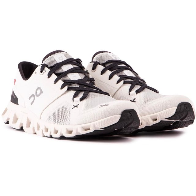 The On Cloud X 3 women's running shoe is a premium sport trainer, that combines style, performance and sustainability. Constructed with a superior upper, these white and black, vegan trainers feature the famous zero-gravity foam cushioning sole technology, a 4D outsole for maximum comfort and reflective branding. The women's On Clouds make you feel like you're walking on clouds, so you'll keep on running and running with that zero-gravity feeling.