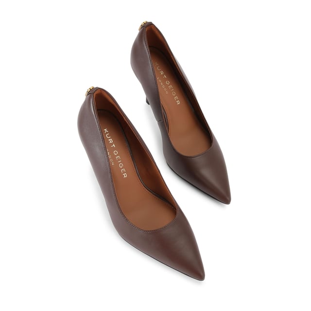 This Kurt Geiger Brixton Court heel is crafted from a dark brown leather. There is an antiqued brass padlock detail on the back of the heel. Heel height: 8.5cm.