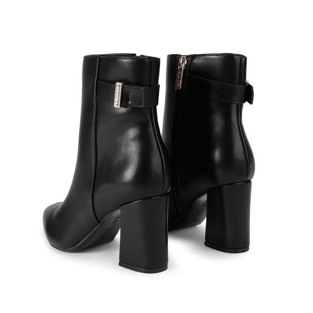 This Carvela Refined Ankle Boot is crafted from a black leather alternative. There is a  gold branded charm on the ankle strap. Heel height: 7.5cm. This product features All Day Long technology.