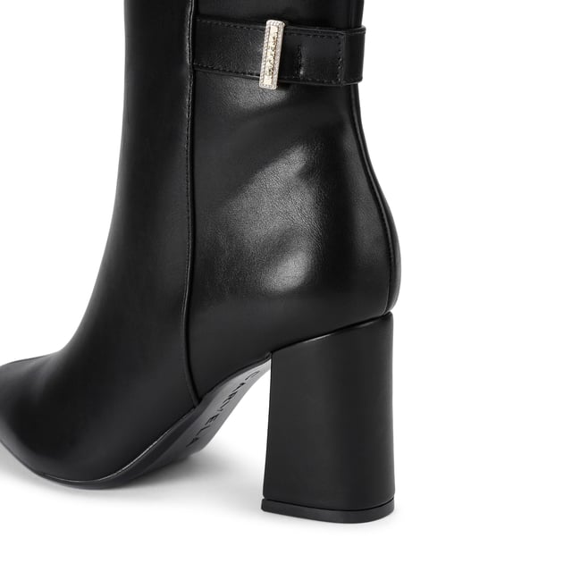 This Carvela Refined Ankle Boot is crafted from a black leather alternative. There is a  gold branded charm on the ankle strap. Heel height: 7.5cm. This product features All Day Long technology.