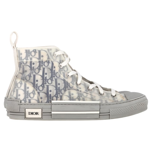 VINTAGE, RRP AS NEW
 Step up your sneaker game with the Dior B23 League High-Top Sneakers, crafted in crisp white canvas and detailed with tonal Dior branding for a clean, contemporary finish. The high-top silhouette and rubber sole offer both comfort and urban-chic appeal. **Style tip:** Pair them with cropped trousers or a flowy midi dress to add a sporty-luxe twist to your everyday look.

Dior B23 League High-Top Sneakers in White Canvas

Condition: Very good
Signs of wear: Include Box., Minor markings, Lightly used but very well maintained. Minor mark at soles & creasing, light scuffing at the soles and heels.
Packaging: Box
Color: White
Material: Canvas 
Size: EU | 42
Measurements: Heel height: 40; Insole length: 310
SKU: NAPPUGBSH524329W