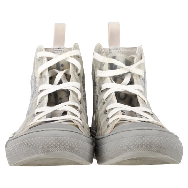 VINTAGE, RRP AS NEW
 Step up your sneaker game with the Dior B23 League High-Top Sneakers, crafted in crisp white canvas and detailed with tonal Dior branding for a clean, contemporary finish. The high-top silhouette and rubber sole offer both comfort and urban-chic appeal. **Style tip:** Pair them with cropped trousers or a flowy midi dress to add a sporty-luxe twist to your everyday look.

Dior B23 League High-Top Sneakers in White Canvas

Condition: Very good
Signs of wear: Include Box., Minor markings, Lightly used but very well maintained. Minor mark at soles & creasing, light scuffing at the soles and heels.
Packaging: Box
Color: White
Material: Canvas 
Size: EU | 42
Measurements: Heel height: 40; Insole length: 310
SKU: NAPPUGBSH524329W