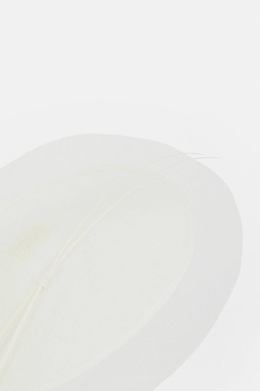 Showcasing an innovative combination of pleated mesh and spiral details, this fascinator adds an elegant finishing touch to occasionwear ensembles.Browse this seasons women's fascinators or discover the full range of women's accessories now.
