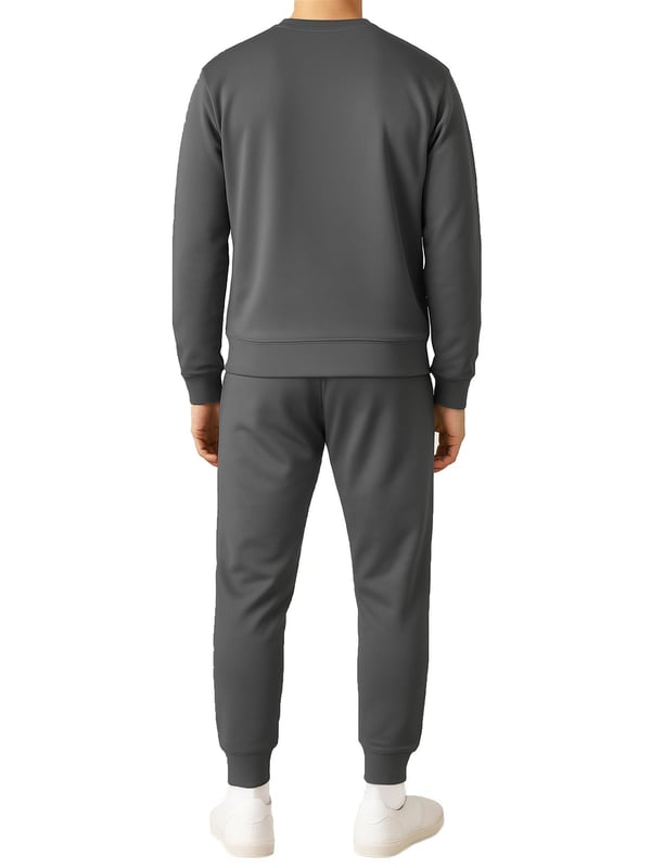This men’s polyester tracksuit set features a long-sleeve crew neck pullover sweatshirt with matching joggers. Designed with ribbed details, an adjustable drawstring waistband, and side pockets, it combines comfort with practicality. The breathable fabric allows easy movement, making it perfect for workouts, lounging, or casual everyday wear.