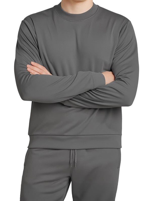 This men’s polyester tracksuit set features a long-sleeve crew neck pullover sweatshirt with matching joggers. Designed with ribbed details, an adjustable drawstring waistband, and side pockets, it combines comfort with practicality. The breathable fabric allows easy movement, making it perfect for workouts, lounging, or casual everyday wear.