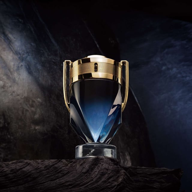 Unleash your inner hero with Rabanne Invictus Parfum, a powerful aromatic fragrance designed for the modern man. This captivating scent combines fresh lavender, sensual black soap, and addictive sandalwood, creating an exhilarating olfactory experience that embodies strength and confidence. The striking V-shaped bottle, adorned with a luxurious gold cap, symbolizes the triumph of the epic hero within you. Invictus Parfum is perfect for those who dare to conquer life's challenges and turn their journey into a legendary tale. Embrace the essence of greatness with every spray.