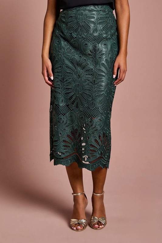 Luxurious PU midi skirt featuring intricate lace overlay with botanical pattern
        Elegant scalloped hem detail adds a refined finishing touch
        Figure-flattering silhouette with a sophisticated midi length
        Designed specifically for petite frames for perfect proportions
        Semi-sheer lace detailing creates a striking textural contrast
    
    This exquisite Petite PU Lace Midi Skirt from Coast combines contemporary style with timeless elegance. The striking botanical lace overlay creates a captivating visual texture whilst the scalloped hem adds a touch of femininity to this sophisticated piece. Perfect for special occasions, this skirt pairs beautifully with a simple silk camisole and strappy metallic heels as shown for a wedding guest ensemble that commands attention. For race day events, complement with a tailored blazer and fascinator for a look that balances tradition with modern flair. The midi length is particularly flattering on petite frames, whilst the PU fabrication offers structure and durability. This versatile piece transitions effortlessly from formal daytime events to evening soires, making it a valuable addition to your occasion wardrobe.