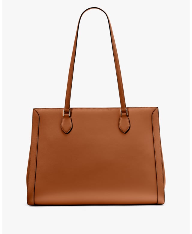 Stay Organized On The Go With Our Madison Laptop Tote. Stylish And Practical, It's Crafted From Durable Saffiano Leather With A Sleek East-West Design. Plus, It Features Multiple Pockets For Essentials Like A Laptop, Wallet And More., Madison Saffiano Leather East West Leather Laptop Tote, Metal Pinmount With Logo, Back Zip And Front Slip Pockets, Middle Zip Compartment,  Length: 17.00 Cm,  Width: 28.50 Cm,  Height: 39.50 Cm