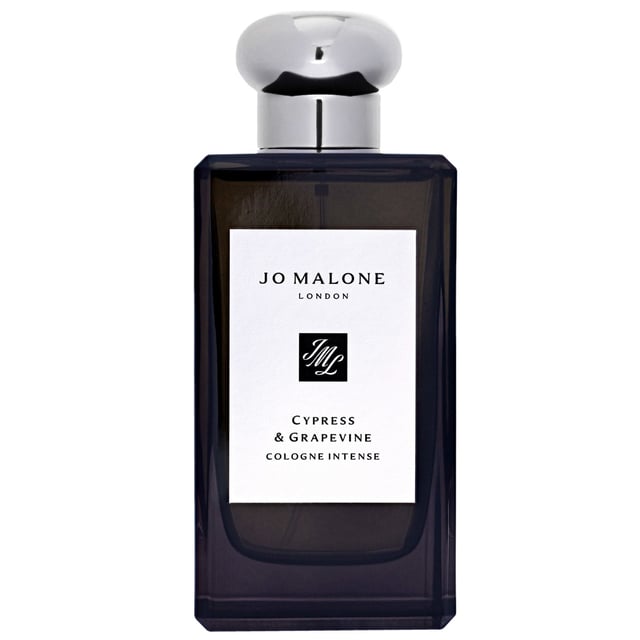 Jo Malone Cypress & Grapevine Intense Eau de Cologne Spray - 100ml Unisex Fragrance Experience the bold and captivating scent of Jo Malone's Cypress & Grapevine Eau de Cologne Intense Spray. This unisex fragrance features a refreshing cypress top note that merges beautifully with a heart of grape accord, vetiver, cedar, and amber. The earthy mossy base note adds warmth and depth to this vivid fragrance, making it perfect for any occasion. With a weight of 306 grams, this 100ml bottle is designed to elevate your fragrance collection. Please note that packaging may vary.