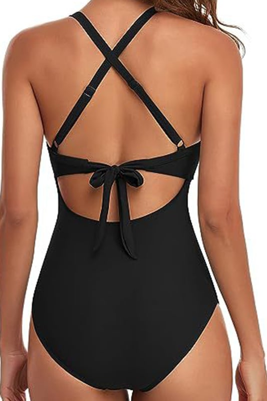 Our styles are designed with a trendy fitted look in mind following an international size standard. For the best fit we suggest choosing one size up from your usual. Be sure to check our sizing chart to find your perfect match!
  Two
  tone Black Crossed Cutout Backless Monokini
  Chic and appealing crossed front design
  Cut
  out front and open back with adjustable tie
  Sexy and daring look
  Available in sizes S M L XL and 2XL
  Perfect for a beach holiday
Material: 82% Polyester 18% Spandex