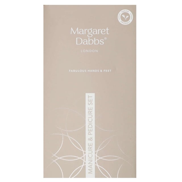 Transform your self-care routine with the Margaret Dabbs London Luxury Manicure & Pedicure Set. This exquisite collection includes essential tools such as a professional foot file, crystal nail file, super shiner buffer, cuticle pusher, nail scissors, and a curved toenail clipper, all housed in a stylish vegan leather case. Perfect for maintaining beautifully groomed hands and feet at home or while traveling, this set is a must-have for any beauty enthusiast. A thoughtful gift that combines luxury and practicality, ensuring cherished moments of pampering for years to come.