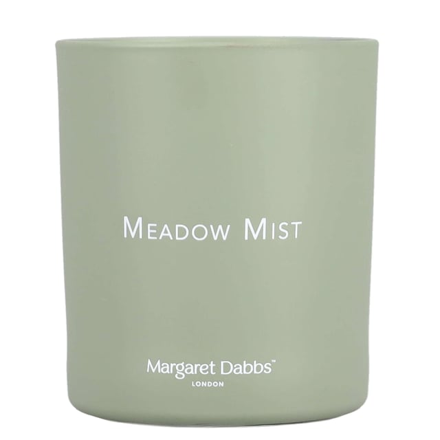 Margaret Dabbs London Meadow Mist Candle with Bergamot & Petitgrain 220g Immerse your space in the enchanting scent of spring with the Margaret Dabbs London Meadow Mist Candle. This 220g candle captures the essence of a wild meadow, featuring refreshing notes of Bergamot and earthy Petitgrain, complemented by delicate floral hints. Enjoy up to 40 hours of this delightful fragrance, crafted from 100% vegan-friendly, natural soy wax, ensuring it is GMO and additive-free. Handmade in the UK, each candle is elegantly poured into a recyclable and refillable glass container, making it a perfect eco-friendly addition to your home.