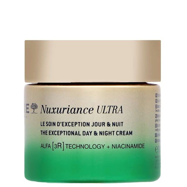 Experience the transformative power of Nuxe Nuxuriance Ultra The Exceptional Day & Night Cream. Infused with Niacinamide, this luxurious cream enhances your skin's radiance and evens out skin tone for a youthful glow. Suitable for women, this cream is designed for daily use. To apply, take a generous amount, warm it between your hands, and massage gently onto your face, working from the center outwards. For best results, use morning and night to revive your complexion and enjoy beautifully radiant skin. Size: 75 ml.