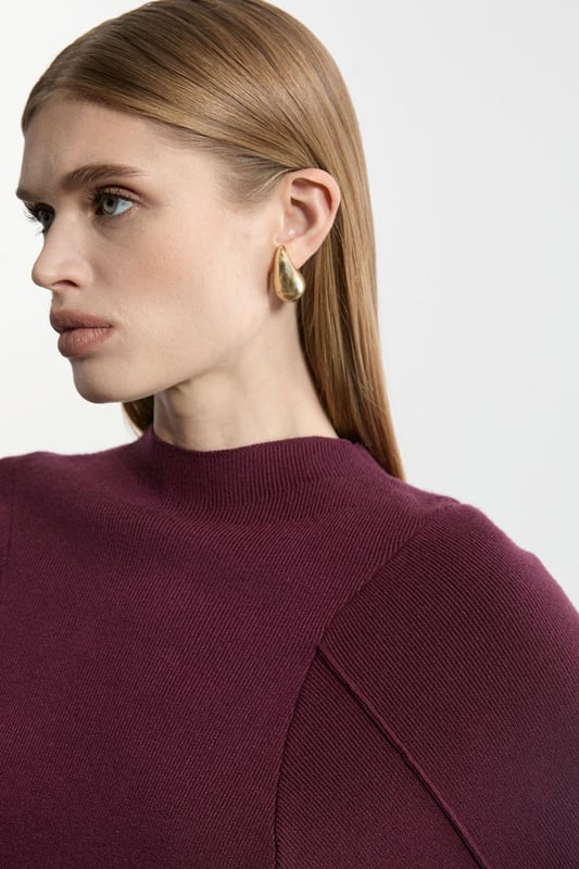 Introducing By Lydia: An Elegant Invitation - a new season collection with Lydia Millen, infused with sophistication and flair for the party season. Go seamlessly from day to night in our midi dress, made in soft knit fabric, featuring long sleeves, and a comfortable, relaxed fit that cinches at the waist to flaunt the figure. Style it simply with heeled boots or pointed toe heels for a look that will take you from date nights to upcoming parties and events. Lydia Millen Wool Look Rounded Sleeve Knit Midaxi Dress Seamless Knit Fabric Flattering Relaxed Silhouette Cinched Waistline Straight Hanging Skirt High Neckline