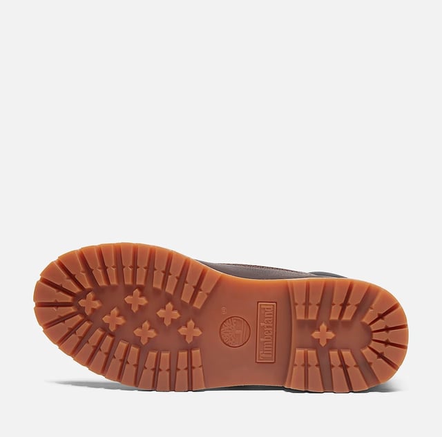 Boots crafted with a premium full-grain pebbled textured leather upper for a durable and stylish finish. Featuring seam-sealed waterproof construction to keep feet dry in all conditions. Completed with a rugged rubber lug outsole for reliable traction and performance