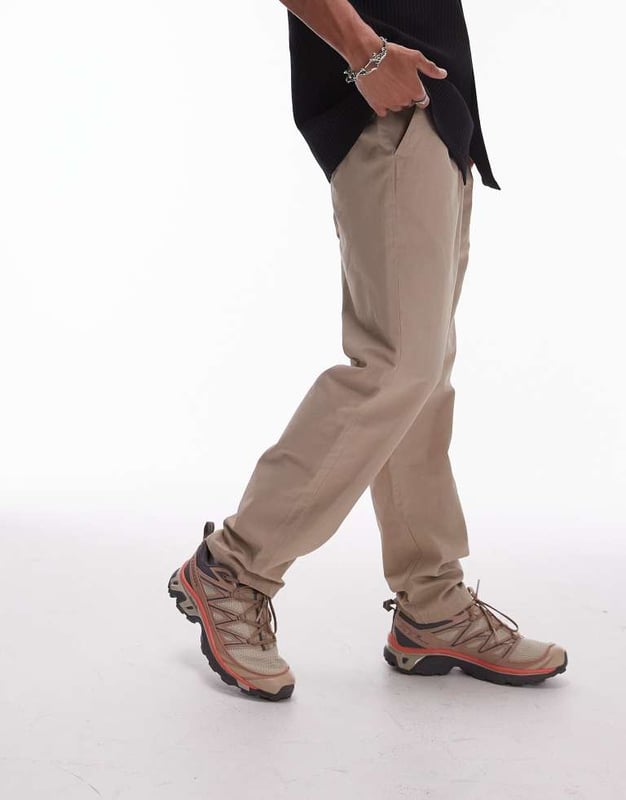 Trousers & Chinos by Topman This is Topman Mid rise Elasticated waistband Concealed fly Side pockets Regular, tapered fitSold By: Asos