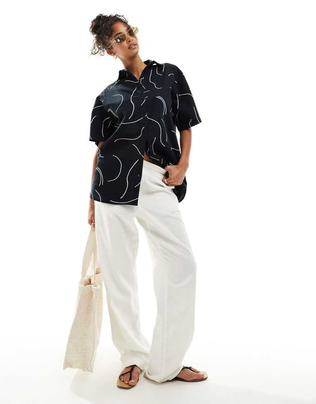 ASOS DESIGN oversized shirt with linen in mono print co-ord Tops by ASOS DESIGN *Saves to inspo folder* Abstract design Spread collar Button placket Oversized fitSold By: Asos