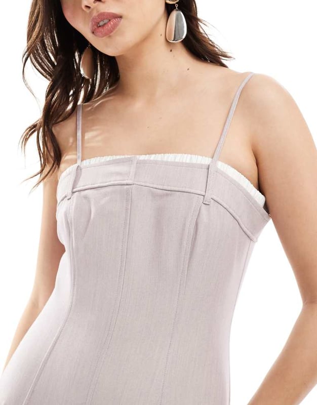ASOS DESIGN contrast panel wide leg jumpsuit in stone Jumpsuits & Playsuits by ASOS DESIGN Minimal effort, maximum payoff Square neck Adjustable straps Contrast trim Zip-back fastening Wide leg Regular fitSold By: Asos