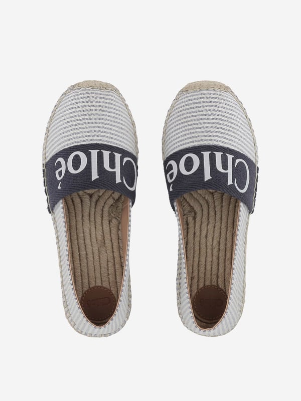 Chloé's Parisian aesthetic explores a modern Bohemian outlook. These girls blue and white espadrilles are reflective of the French luxury label's high quality construction and precision of beauty. Made in an immaculate textile design via sheep leather lining, rope soles, and a Chloé branded illustration on the top. She will be obsessed.

Mini Me
Mineral Tanning
Sold in a Chloe Shoe Box
100% Textile