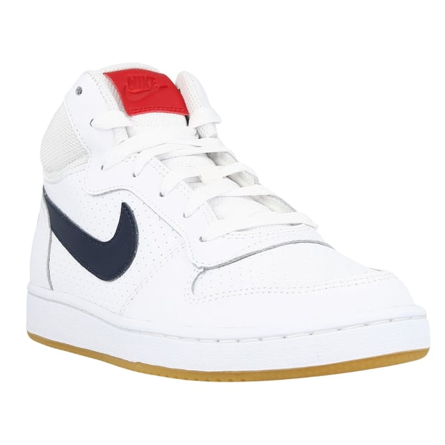 Elevate youthful style and performance with the Nike Court Borough Mid (GS) White Sneakers. Crafted from 100% premium leather, these trainers offer lasting durability and a comfortable fit ideal for all-day wear. The classic white upper is accented with bold black and red details, blending sporty flair with timeless design. Designed to support active feet, these mids provide reliable ankle coverage and cushioning, making them perfect for both on-court action and casual outings. Whether for school or weekend adventures, these sneakers deliver a confident look and dependable comfort every step of the way