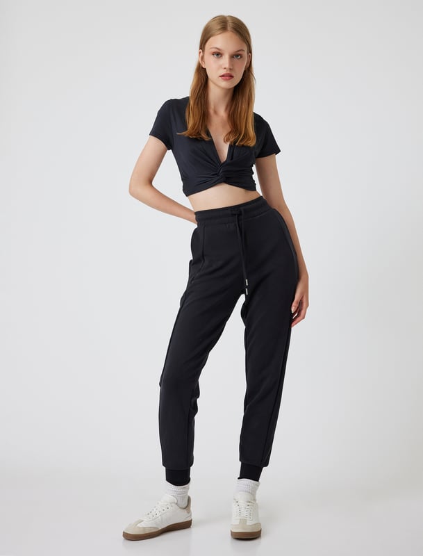 -Mit Nahtdetail -Relax -Jogger -Seitentasche -Krop Länge(Handgelenk) -Hohe Leibhöhe -Hosenbein Mit Gummizug -Sweathose