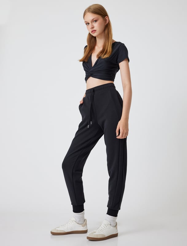 -Mit Nahtdetail -Relax -Jogger -Seitentasche -Krop Länge(Handgelenk) -Hohe Leibhöhe -Hosenbein Mit Gummizug -Sweathose