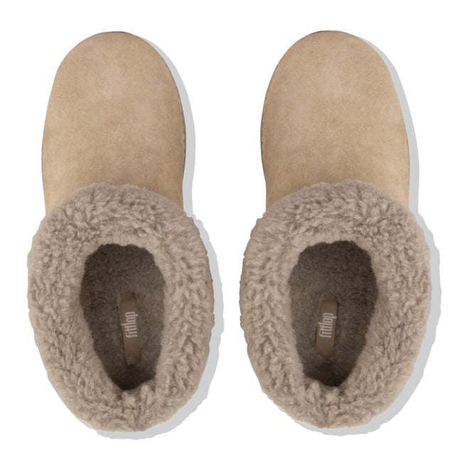 Women's Fit Flop Loaff II Snug Slippers in Beige Womens FitFlop Loaff II Snug Slippers in timberwolf- Light pressure-diffusing Microwobbleboard midsole - triple-density cushioning follows 3 footstep stages (firm heel-soft middle-medium at toes) - Average to wide feet- Microfibre-lined suede uppers with shearling collar and supercozy shearling-lined footbed with a seamless built-in arch contour- Lightweight slip-resistant sole with hardwearing rubber pods - These shoes have been granted the APMA* Seal of Acceptance for footwear found to promote good foot healthRef: BO8-326