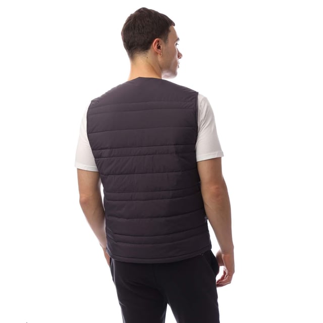 100 % Nylon. Füllung: Synthetische Daunen. Design: Gequiltet. Stofftechnologie: Atmungsaktiv, Leicht, Thermisch. Gefüttert, Gepolstert. Ausschnitt: Rundhals. Ärmellänge: Ohne Ärmel. Verschluss: Druckknopf. Saum: Gerade. S: 38 in. M: 40 in. L: 44 in. XL: 48 in. XXL: 52 in.